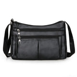 Hladká crossbody kabelka s viacerými vreckami